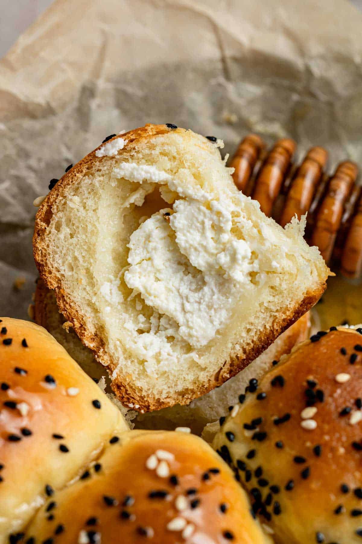 yemeni honeycomb bread cut in half to show the cream cheese center