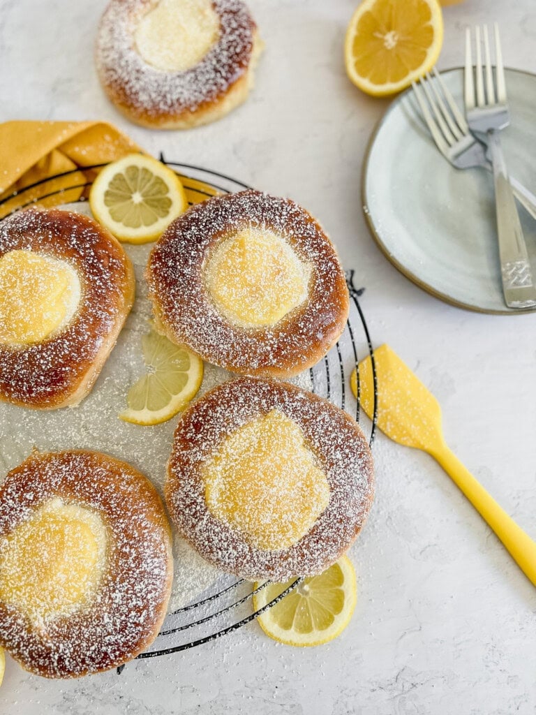 Overhead shot of Sweet Brioche Buns with Lemon Curd on a wire rack