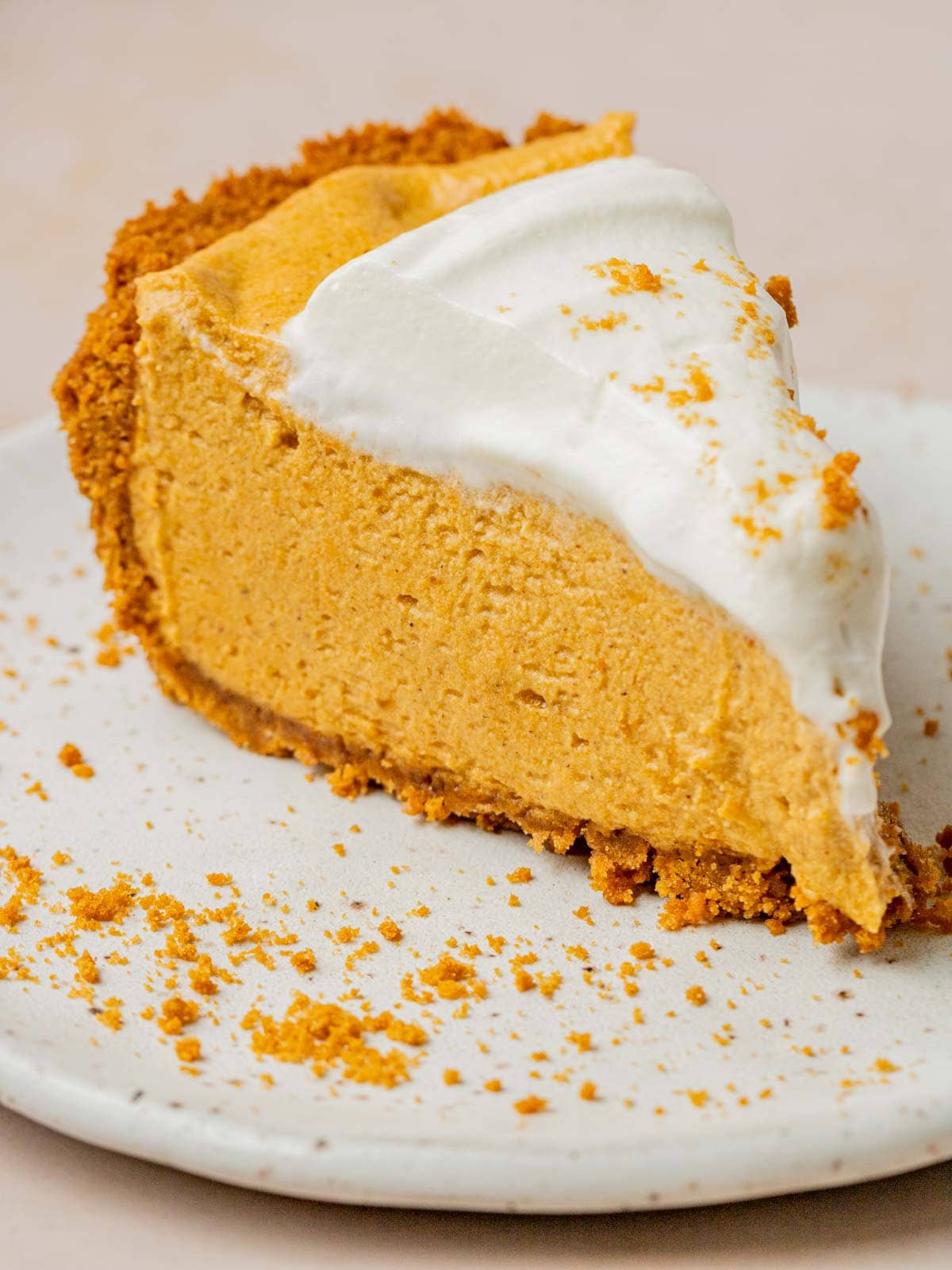 close up slice of biscoff pumpkin pie