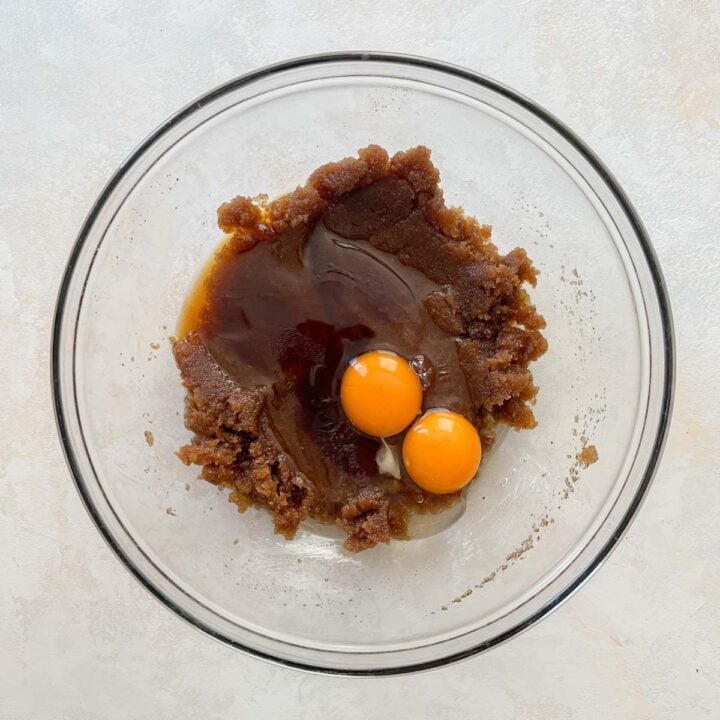 brown butter apple blondies adding the eggs to the batter