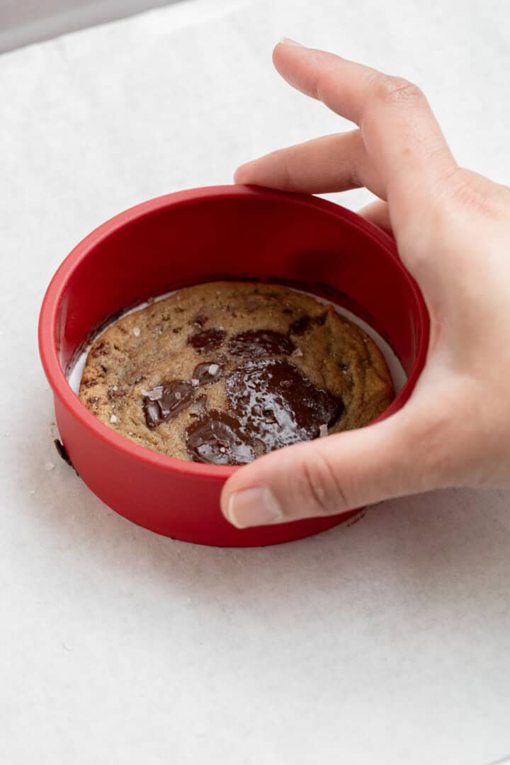 rounding chocolate chip cookies with a cookie cutter
