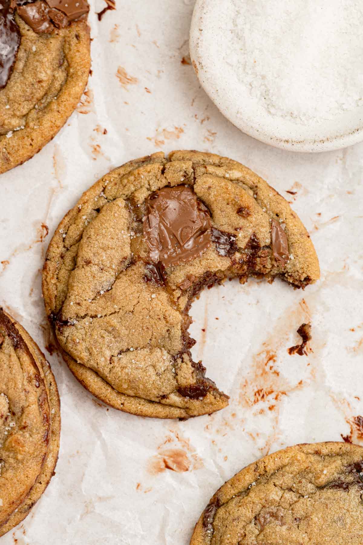 bite taken out of chocolate chip cookie