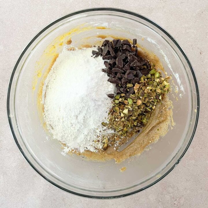 add the dry ingredients, chocolate chunks, and pistachios