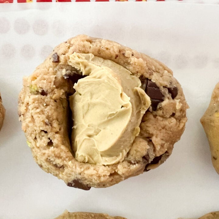 Scoop into balls and then form a hole in the center of the ball and place the chilled pistachio cream ball