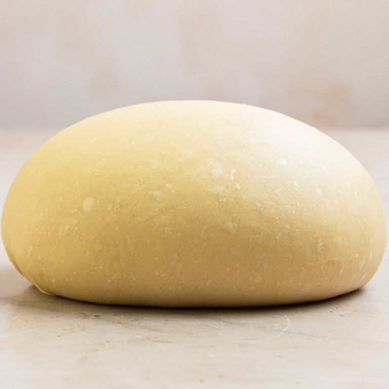 how to make brioche dough feature - dough ball on surface before rising