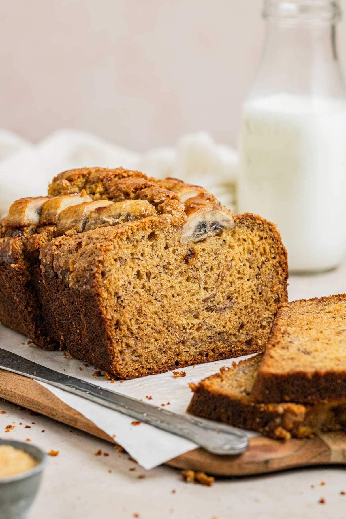 banana bread slices on a wooded board