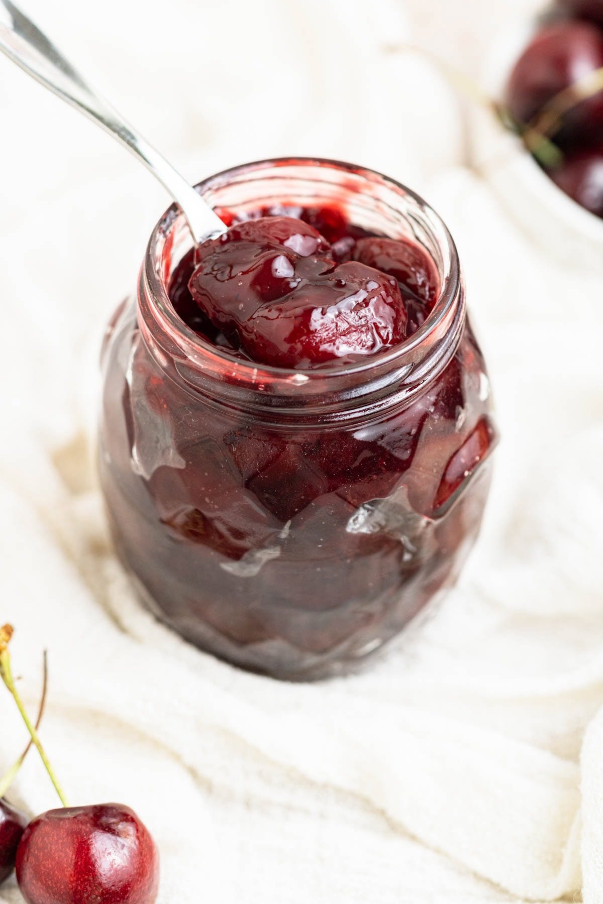 small batch cherry compote in a glass jar